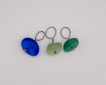 Sea glass charm in blue, sage, and green with stainless steel bail
