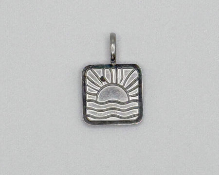 Stainless steel silver sun and waves charm