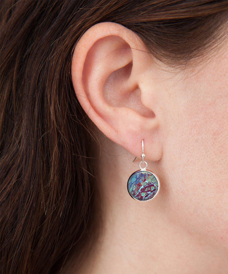 small coral reef dangle earrings on model